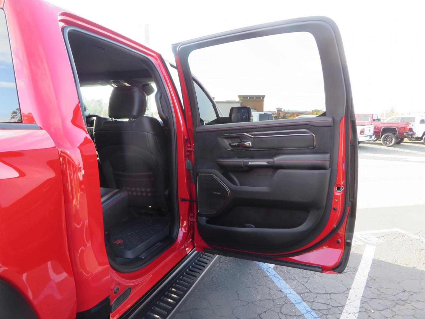 2023 Red /BLACK RAM 1500 Ram 1500 TRX Crew Cab 4x4 (1C6SRFU9XPN) with an 6.2L Supercharged HEMI V8 SRT engine, 8 Speed Auto 8HP95 transmission, located at 2630 Grass Valley Highway, Auburn, CA, 95603, (530) 508-5100, 38.937893, -121.095482 - Must see TRX featuring Eibach front and rear springs, 18" Method NV double black wheels, 37" Nitto Ridge Grappler tires, and window tint. - Photo#57